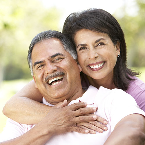 middle age couple smiling outside in mississauga