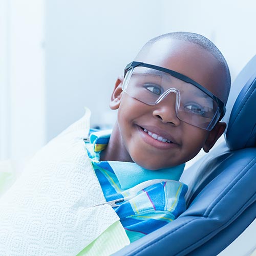 smiling boy waiting for oral exam