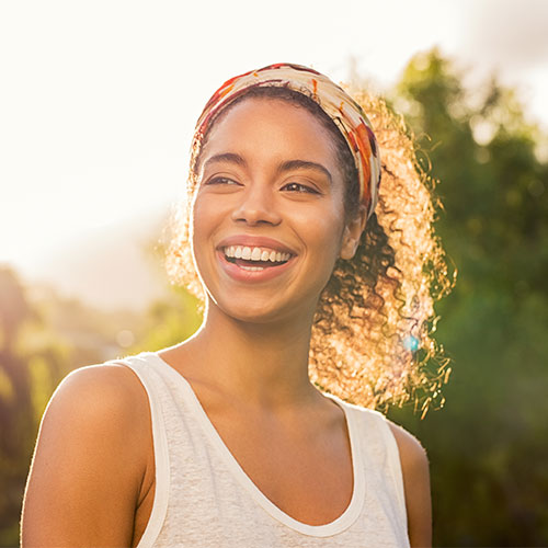 young lady with nice teeth after dental bonding restorative dentistry in Mississauga